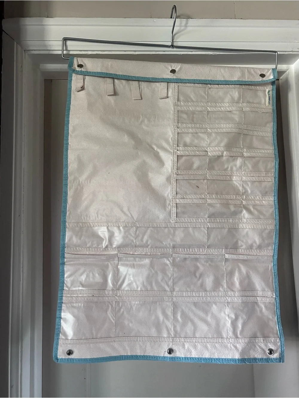 Simple White Canvas Jewelry Organizer with Blue Trim